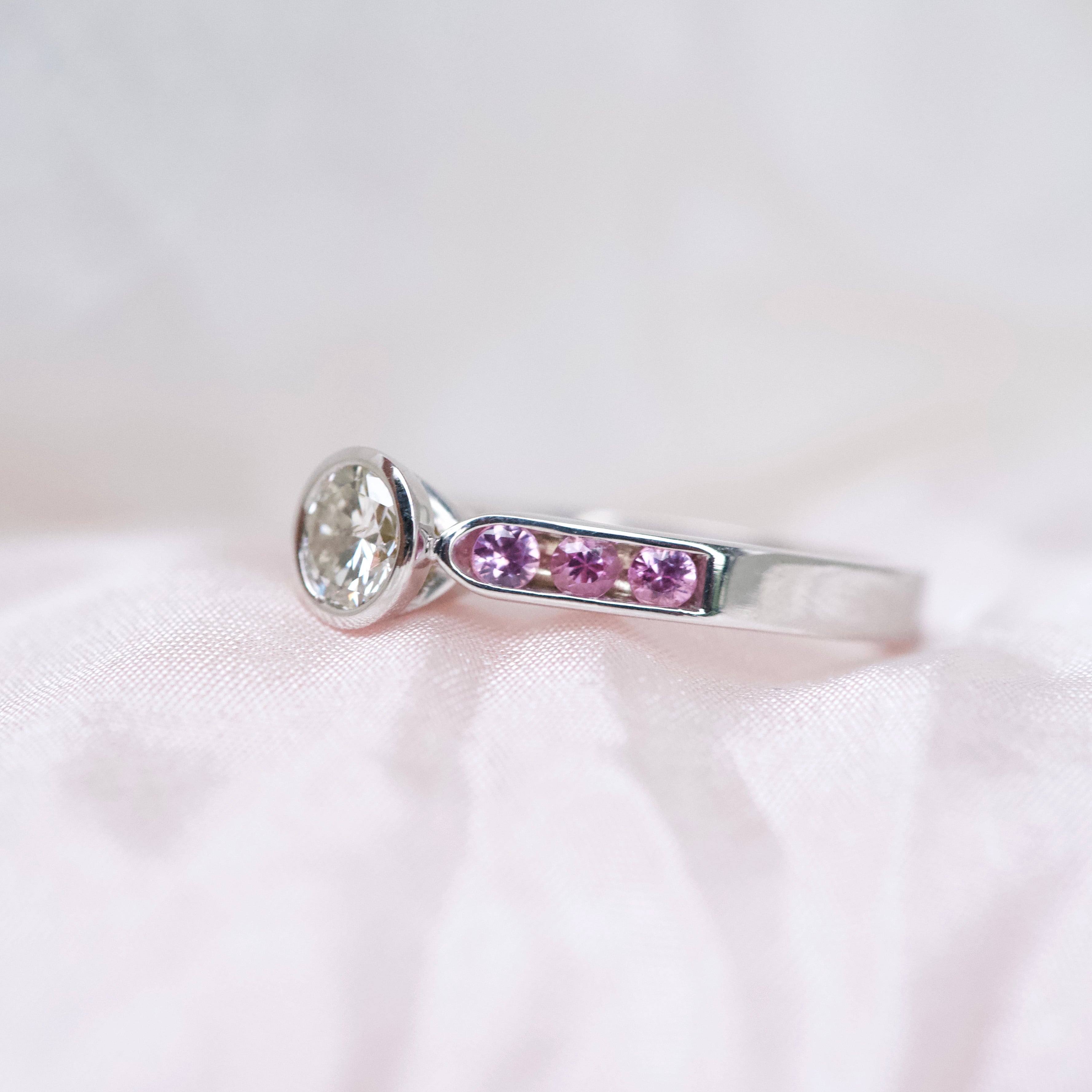 Round Diamond Bezel Set Pink Sapphire Ring