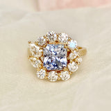 Blue Sapphire and Diamond Cluster Ring in Yellow Gold