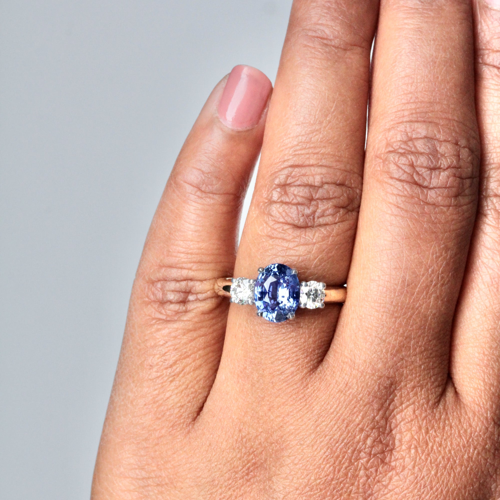 Cornflower Blue Sapphire Oval Trilogy Engagement Ring Two Tone