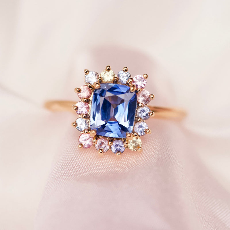 Blue Sapphire Starburst Halo Yellow Gold Ring