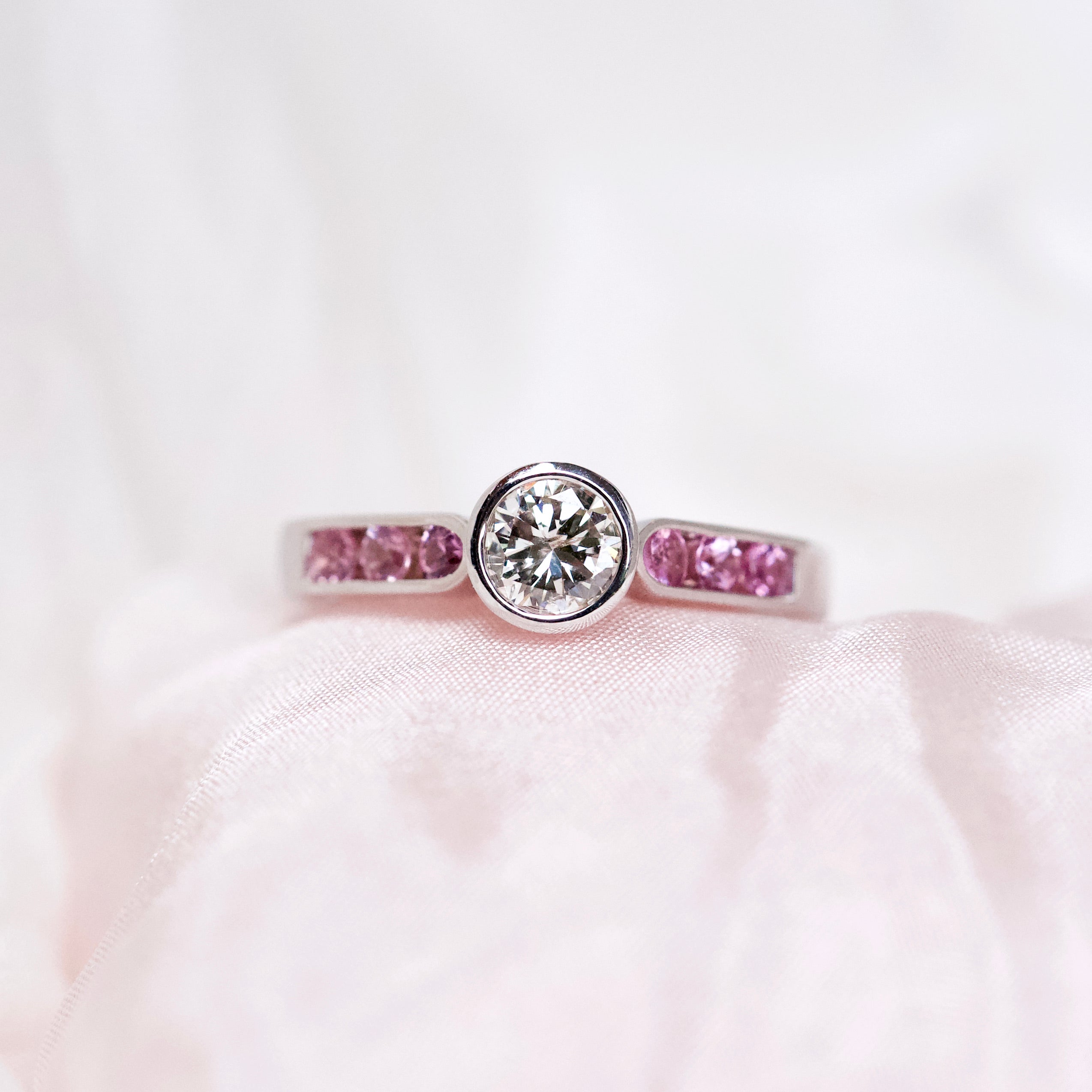 Round Diamond Bezel Set Pink Sapphire Ring