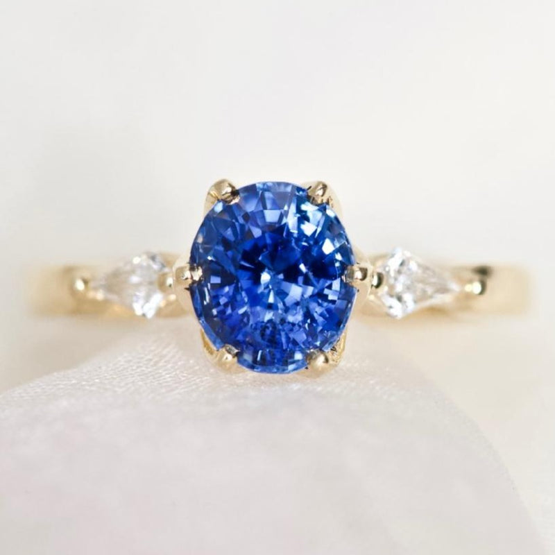 Oval Blue Sapphire Kite Diamond Trilogy Engagement Ring
