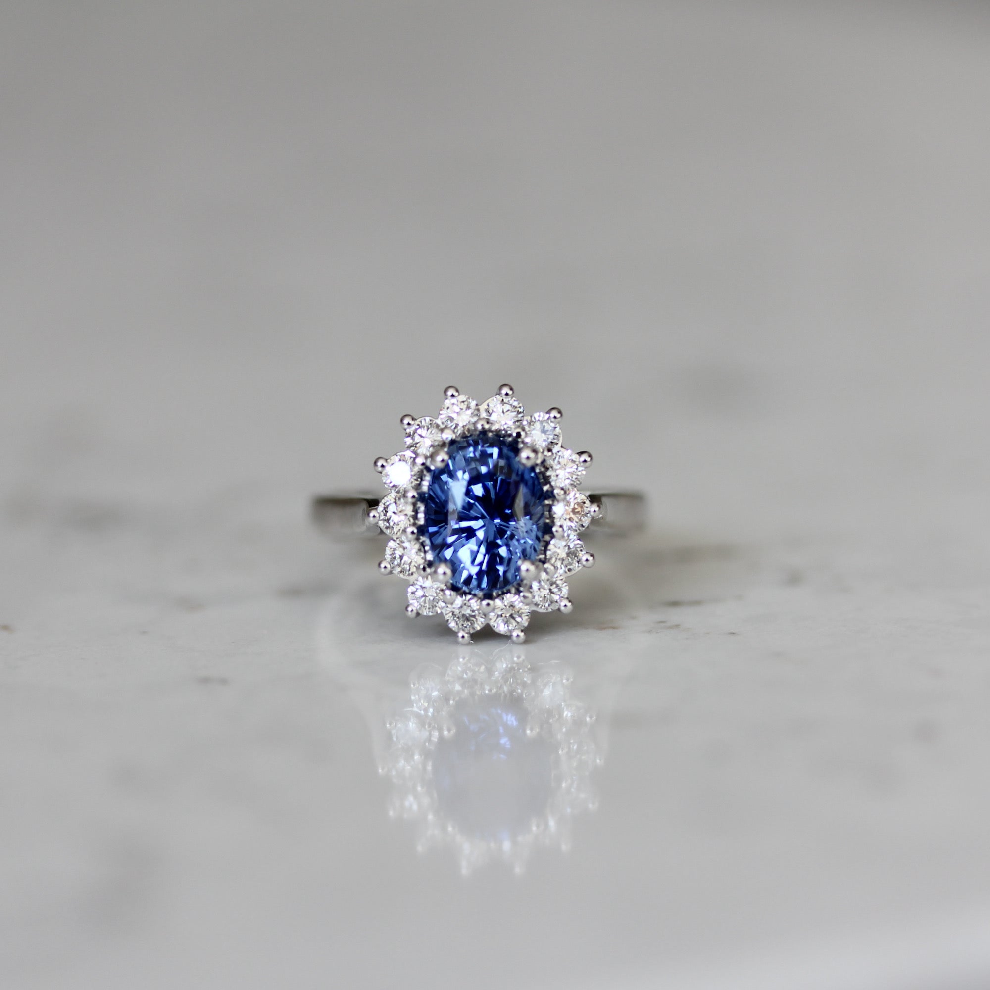 Starburst Halo Cornflower Blue Sapphire Engagement Ring