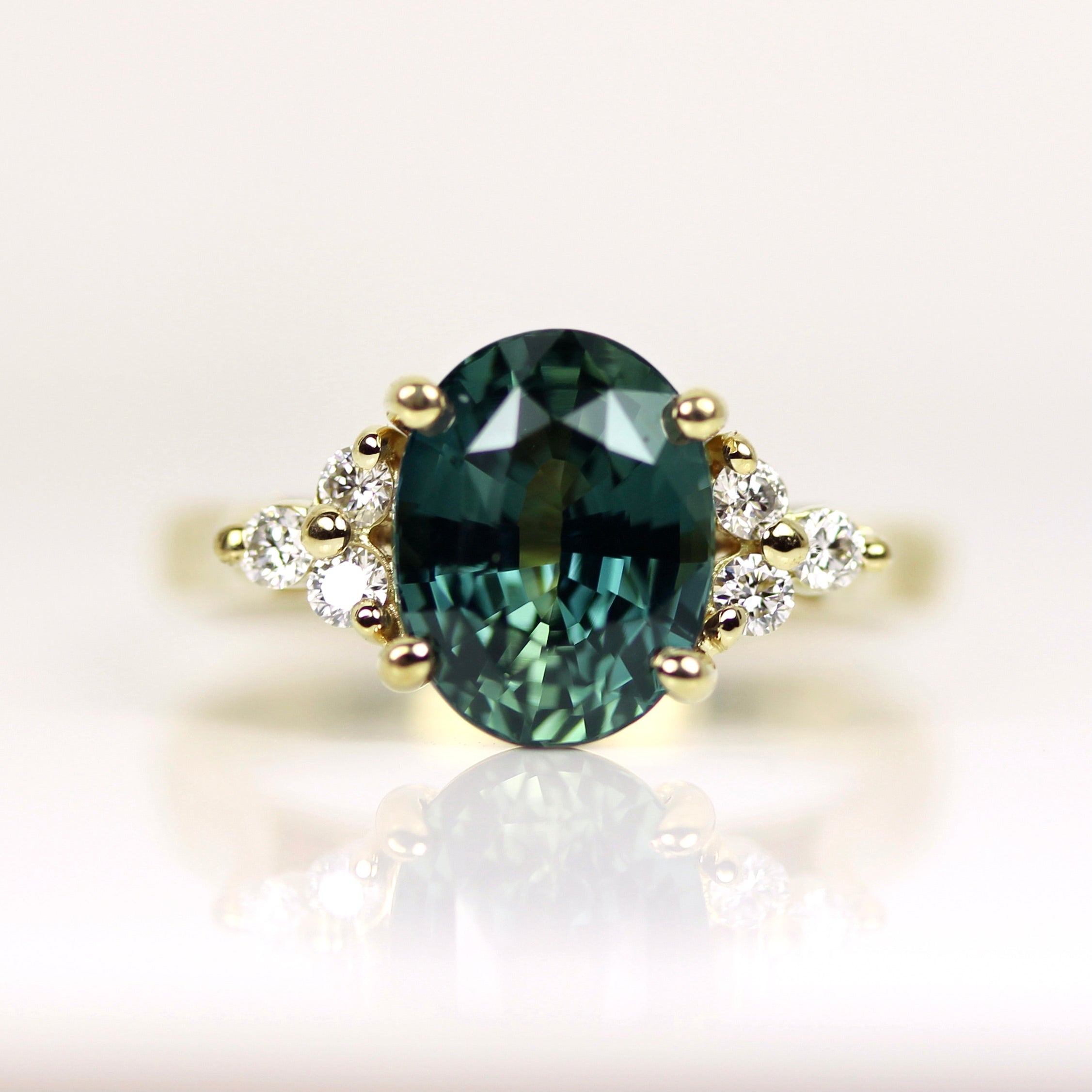 Teal Green Sapphire Engagement Ring in Yellow Gold