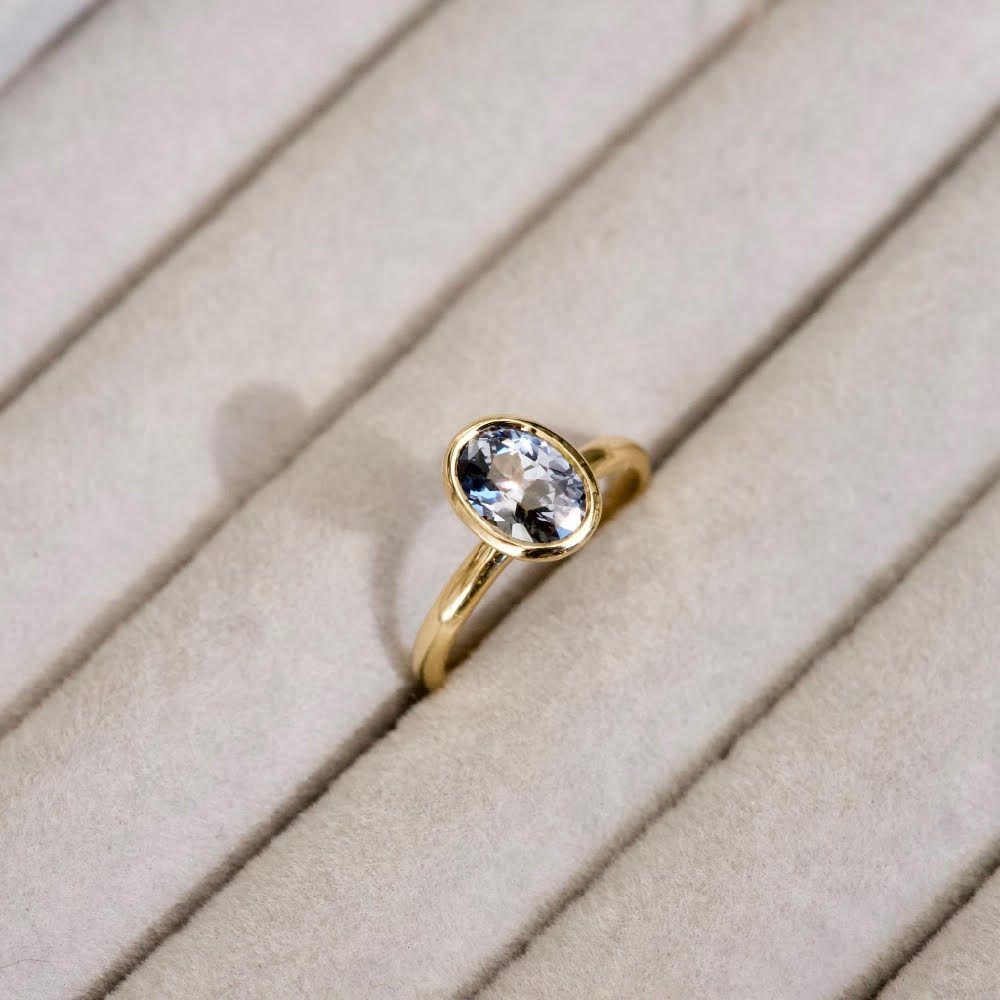 Grey Sapphire Oval Bezel Set Elevated Ring